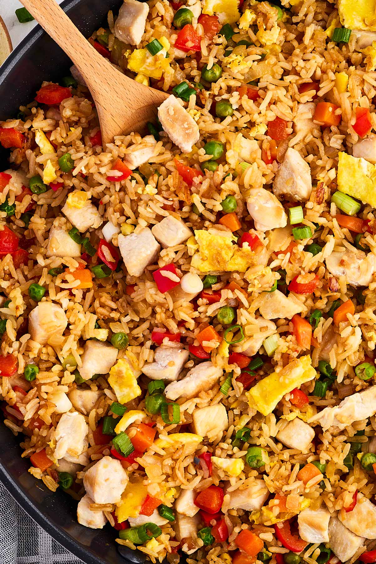 overhead view of chicken fried rice in skillet