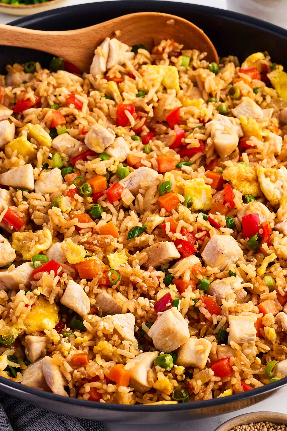 frontal view of chicken fried rice in skillet