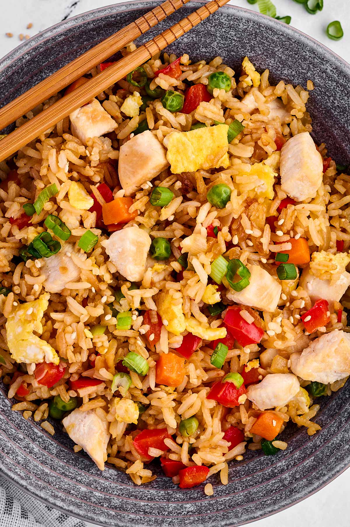 overhead view of chicken fried rice in bowl