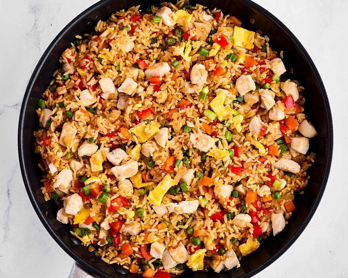 overhead view of chicken fried rice in skillet