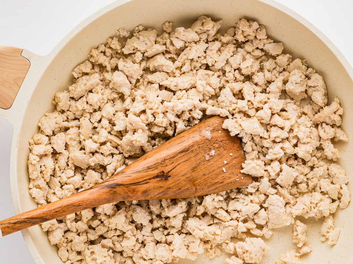 overhead view of cooked ground chicken in skillet