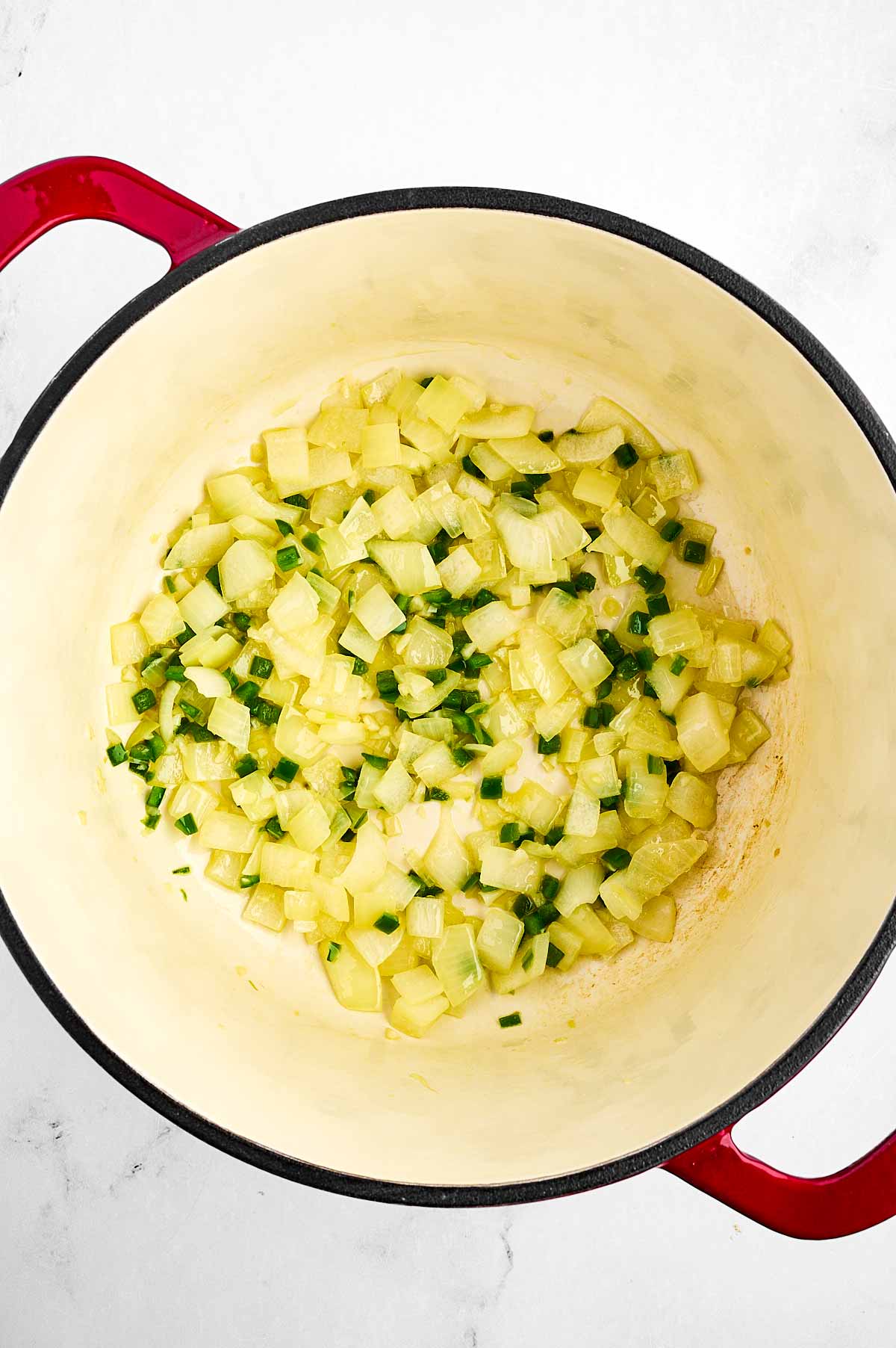 overhead view of cooked aromatics in pot