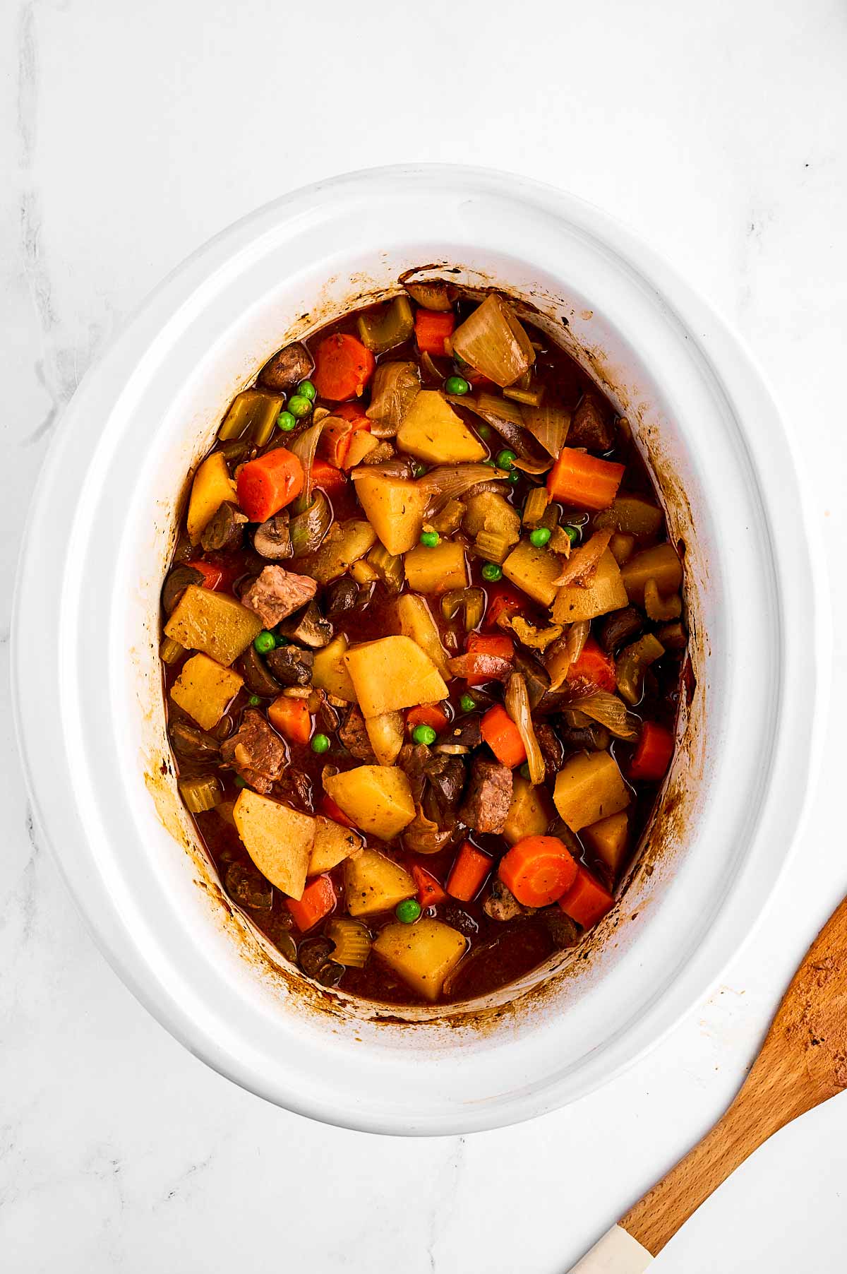 overhead view of beef stew in the slow cooker