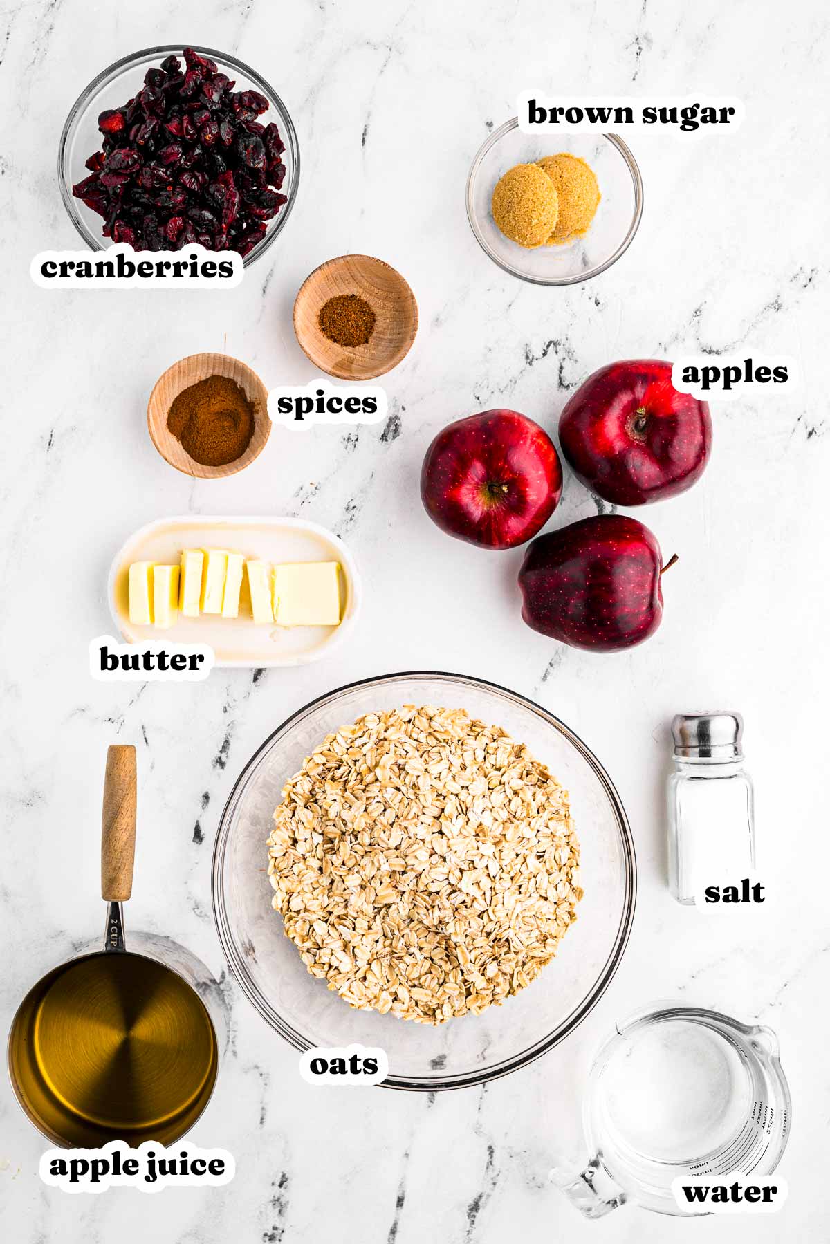 overhead view of ingredients to make crockpot apple cinnamon oatmeal with text labels