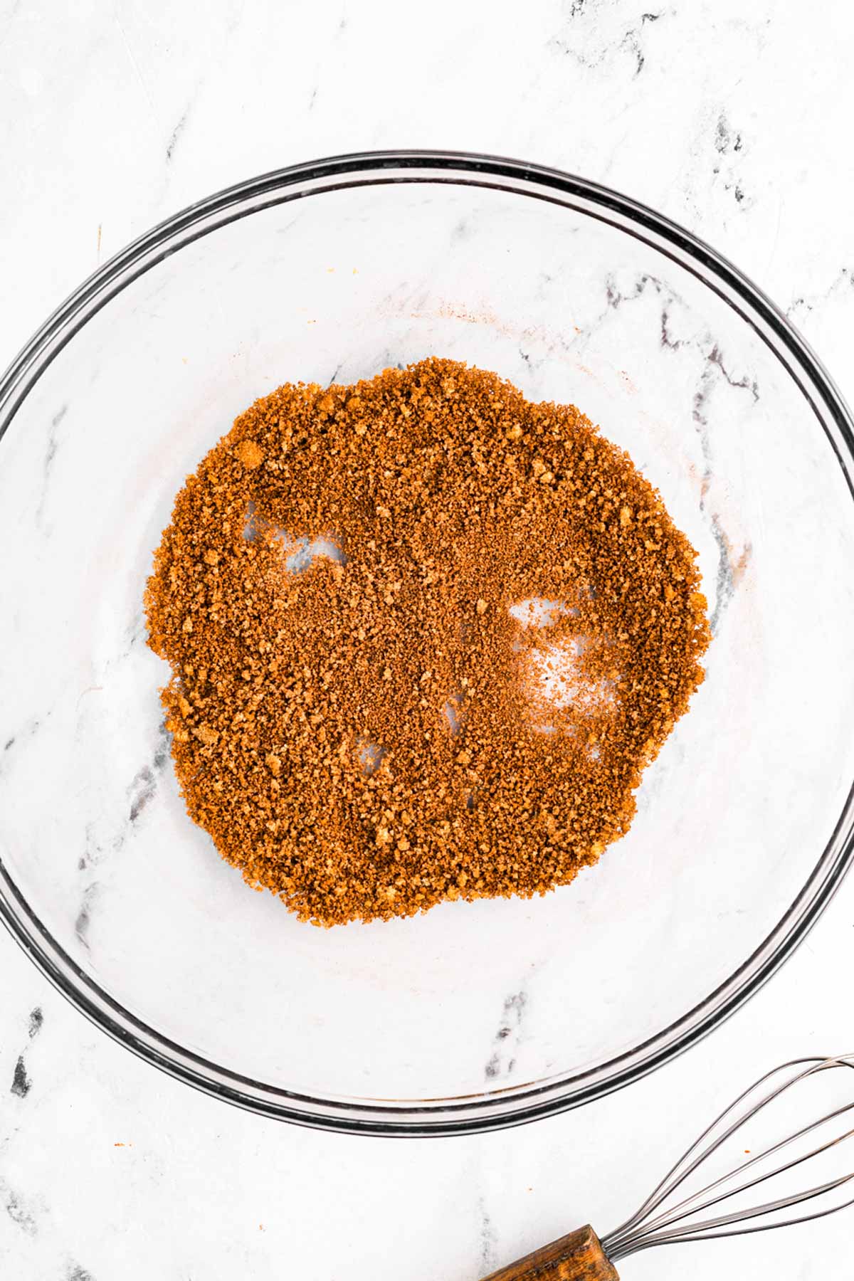 overhead view of cinnamon and sugar in glass bowl