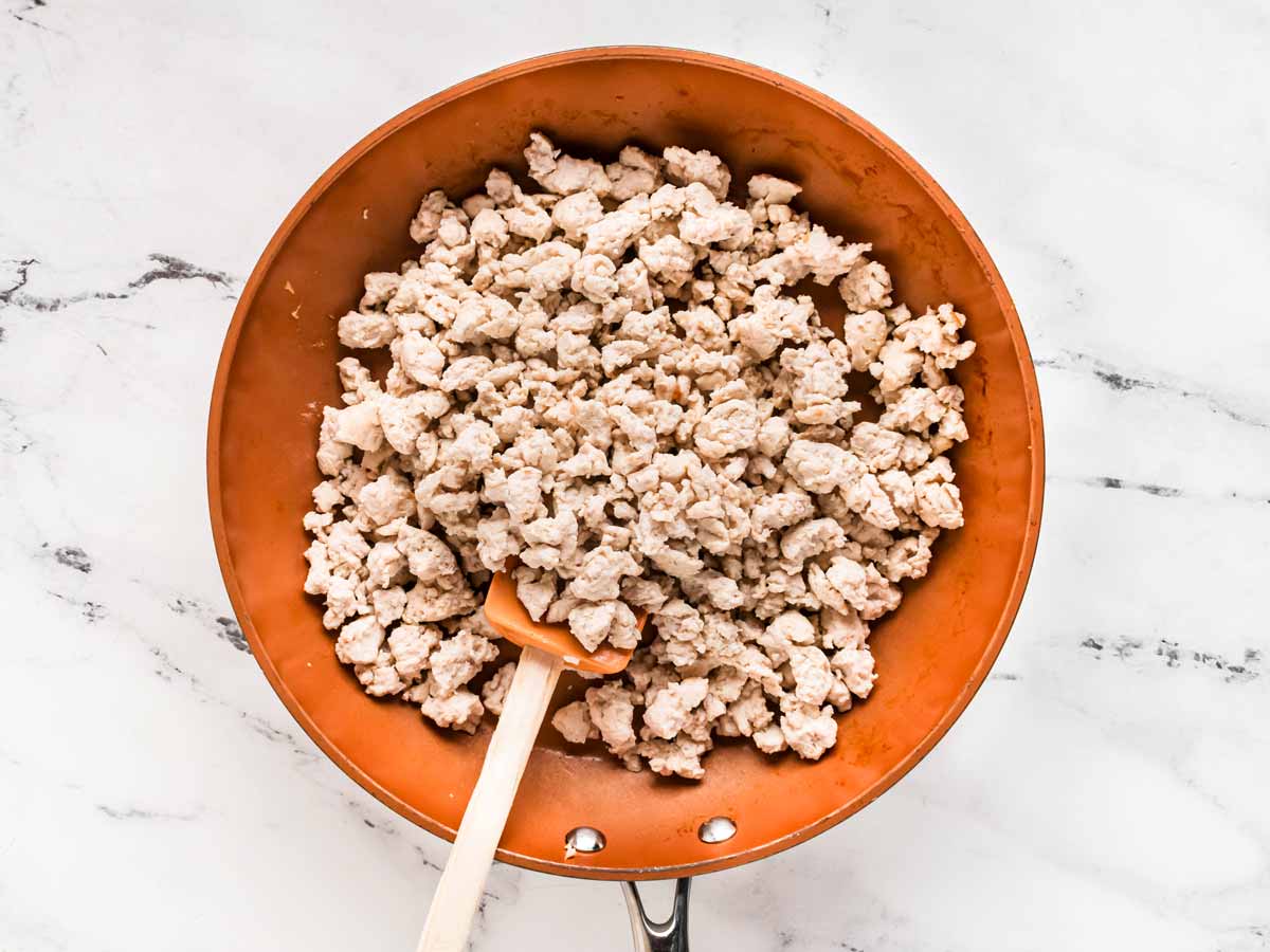 overhead view of cooked ground turkey in skillet