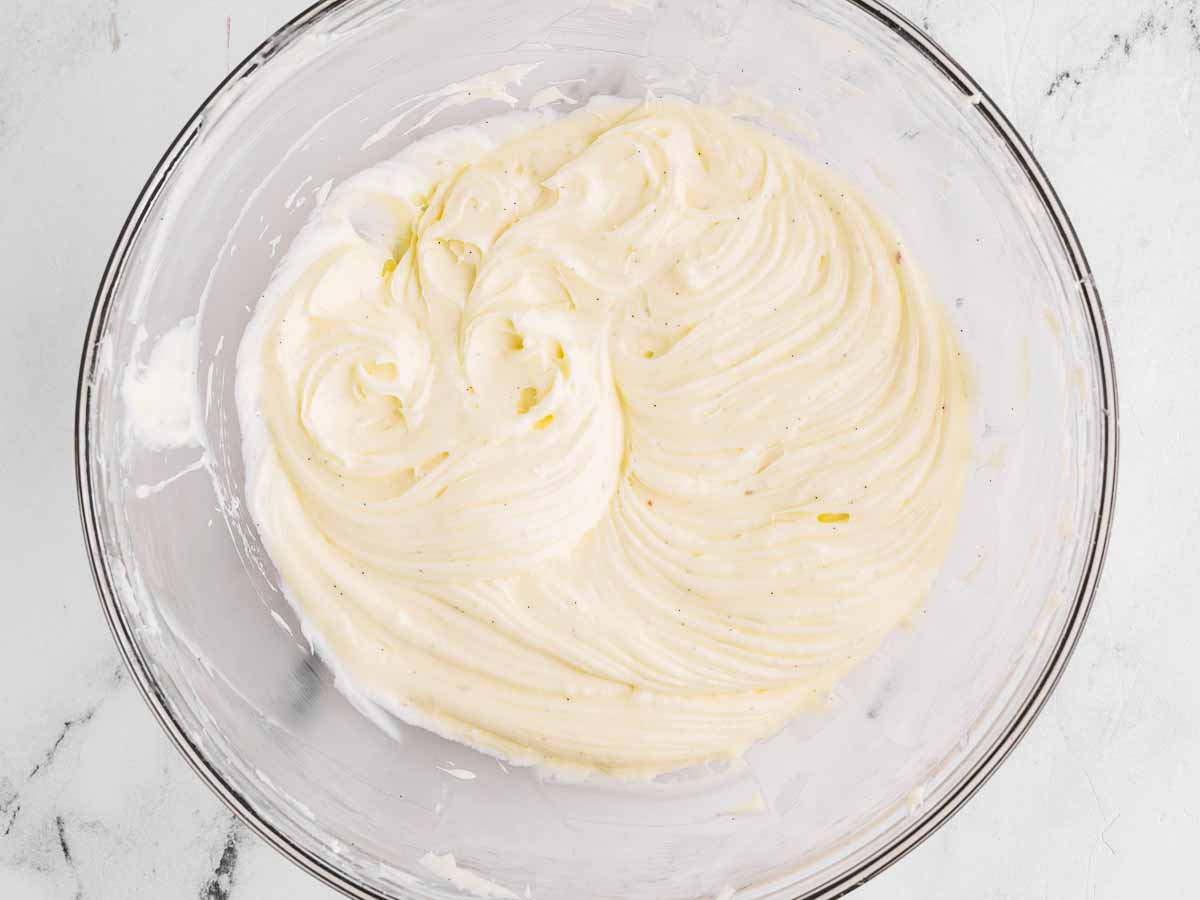 overhead view of cream cheese frosting in bowl