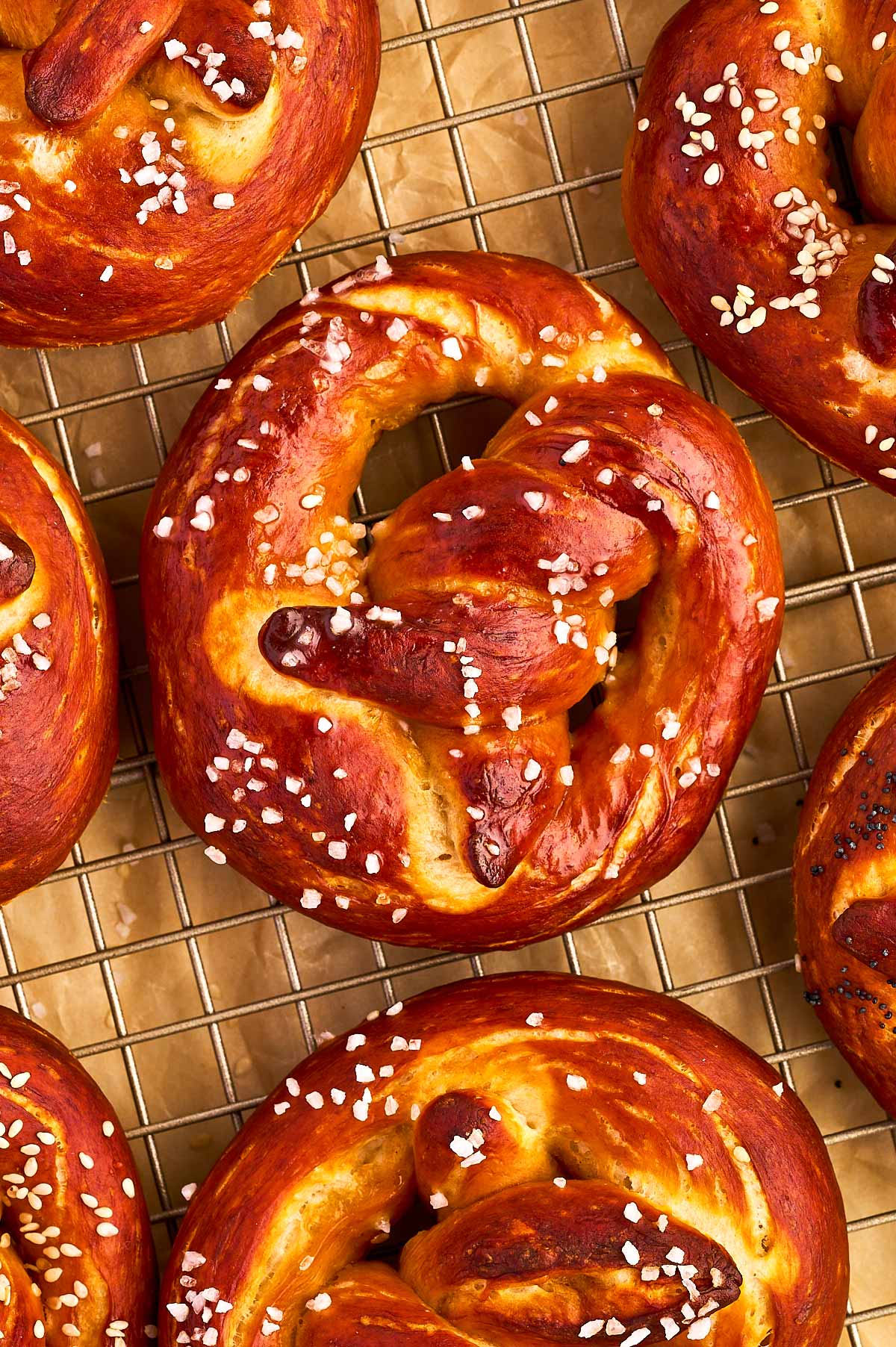 overhead close up view of soft pretzel on wire rack