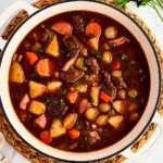 overhead view of beef stew in Dutch oven