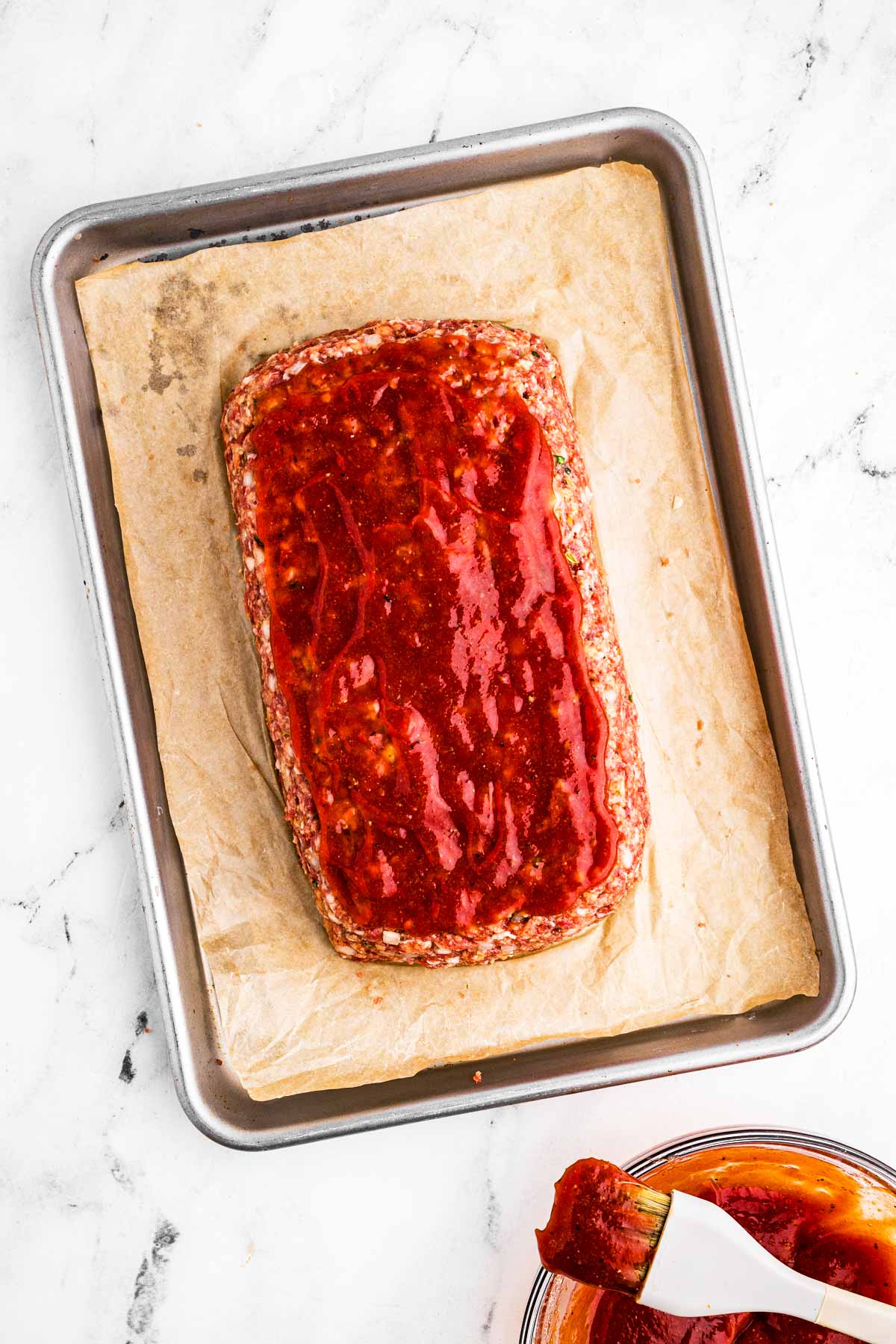 overhead view of glazed unbaked meatloaf