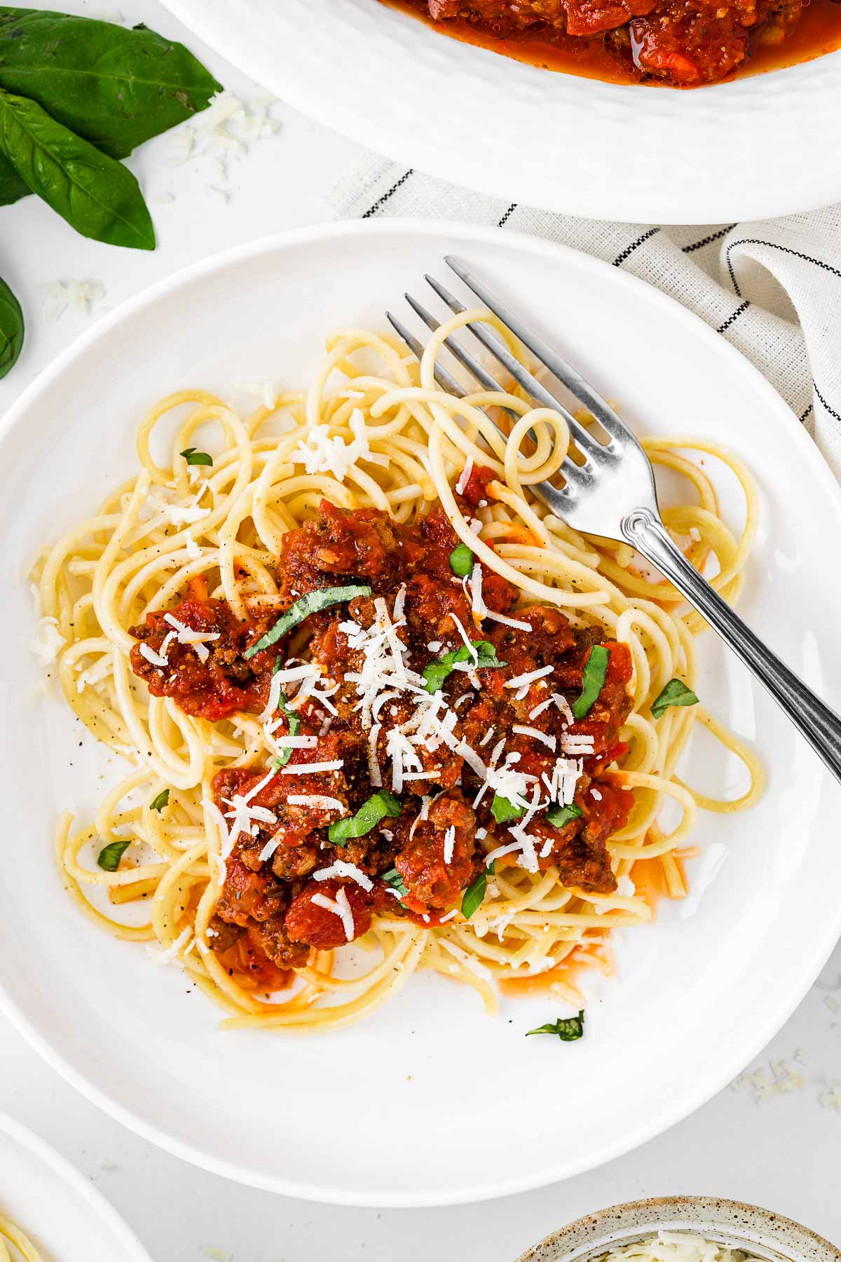 overhead view of spaghetti on plate with meat sauce