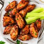 overhead view of chicken wings on plate