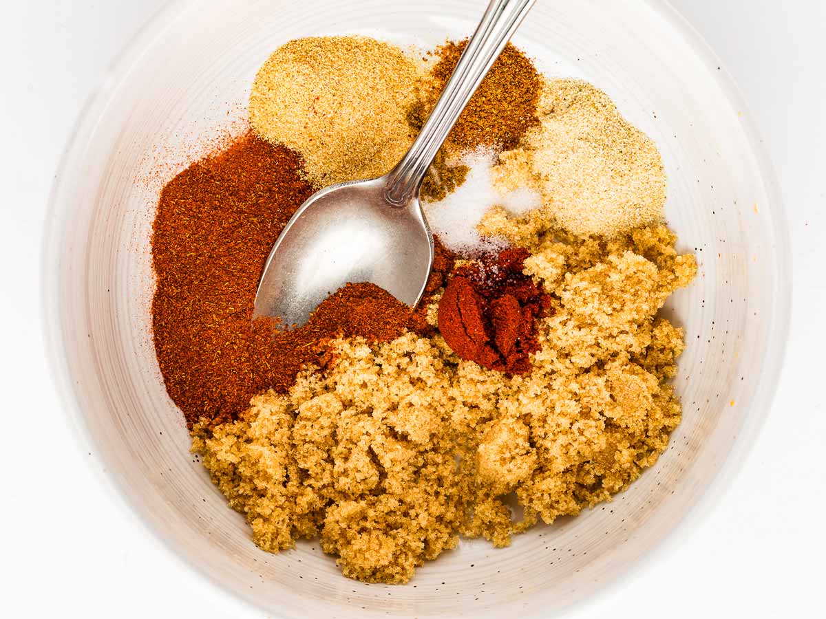 overhead view of small bowl with seasoning mix ingredients before mixing