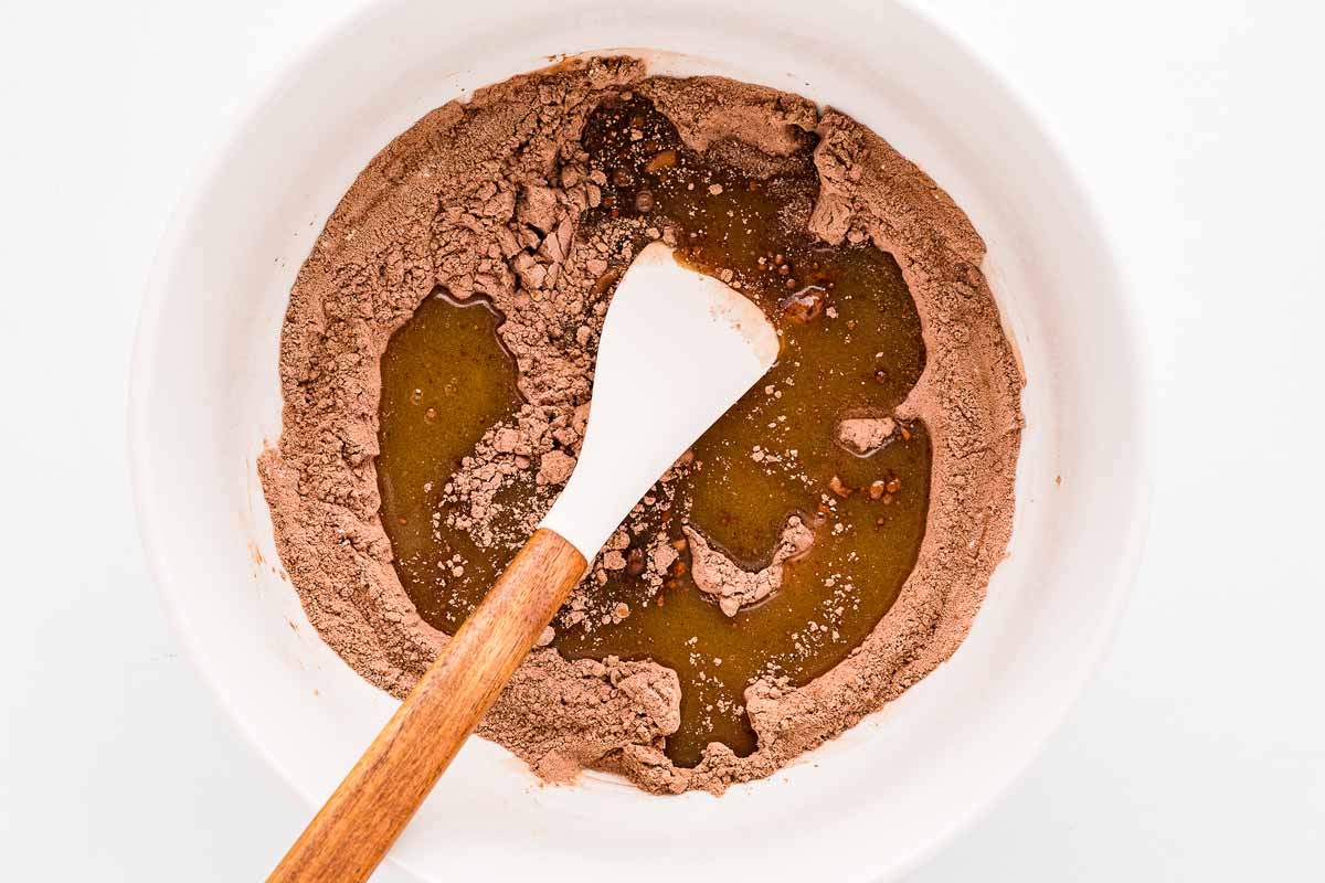 overhead view of chocolate cupcake batter being combined