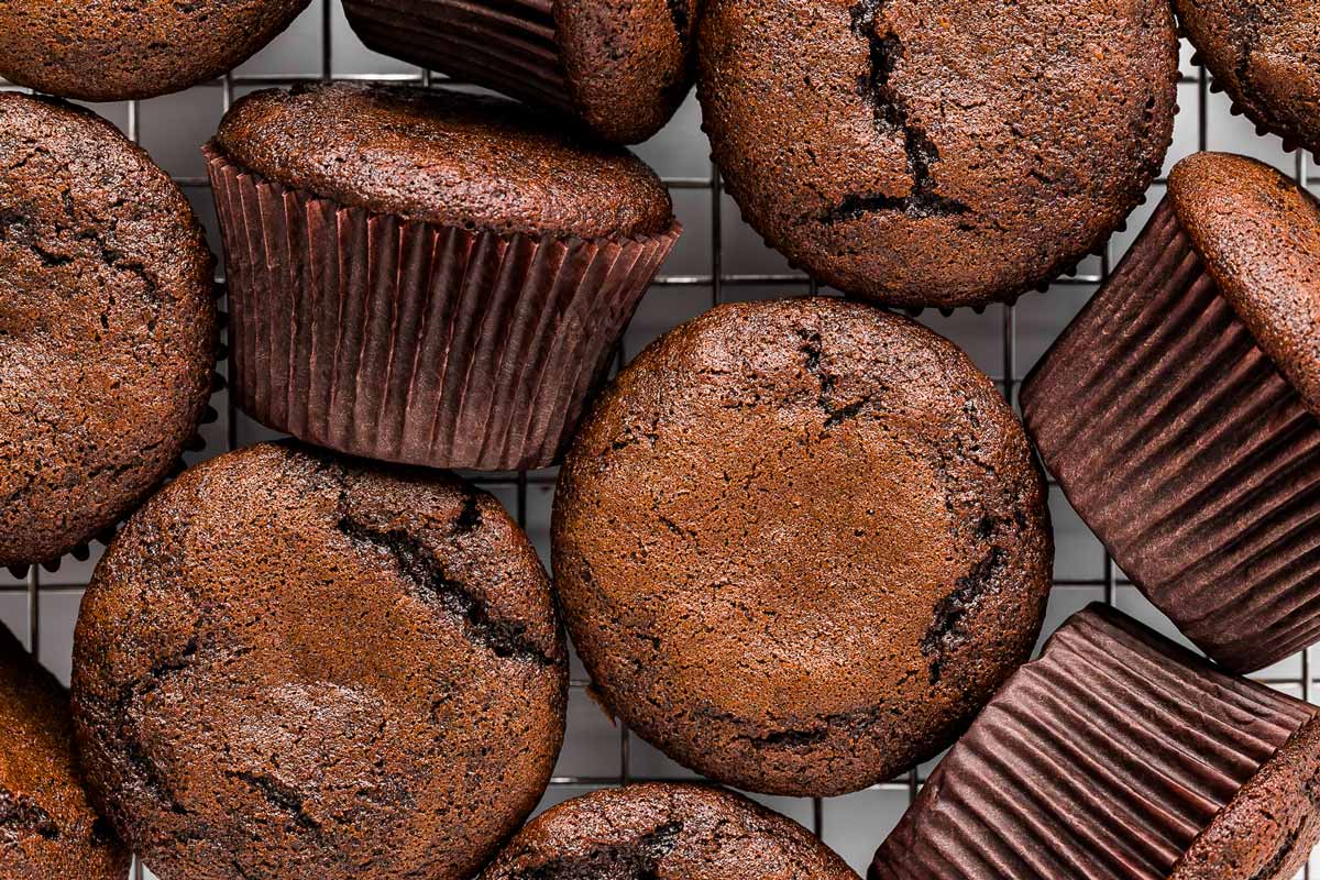 overhead view of chocolate cupcakes on wire rack