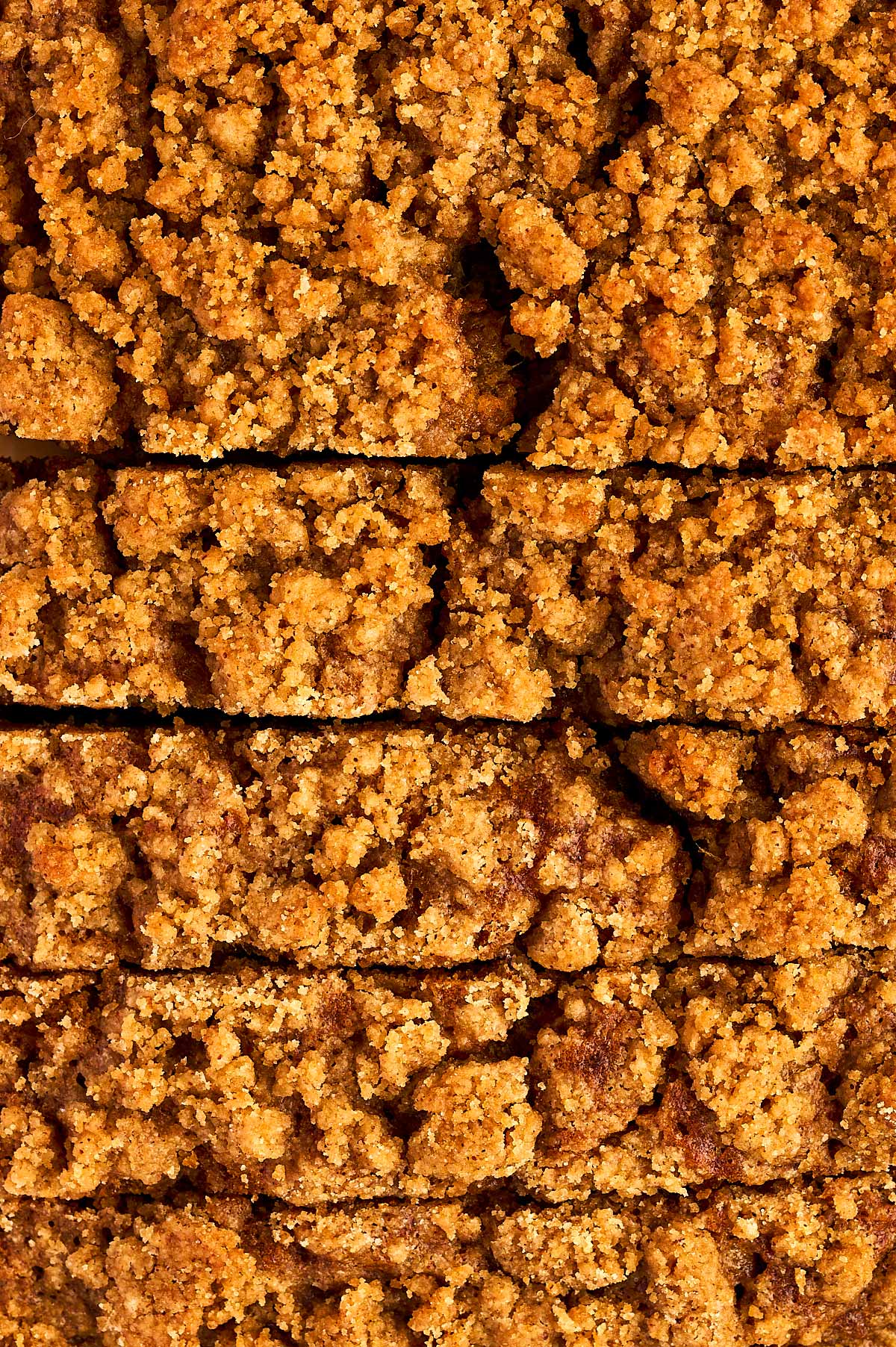 close up view of streusel on top of cinnamon banana bread