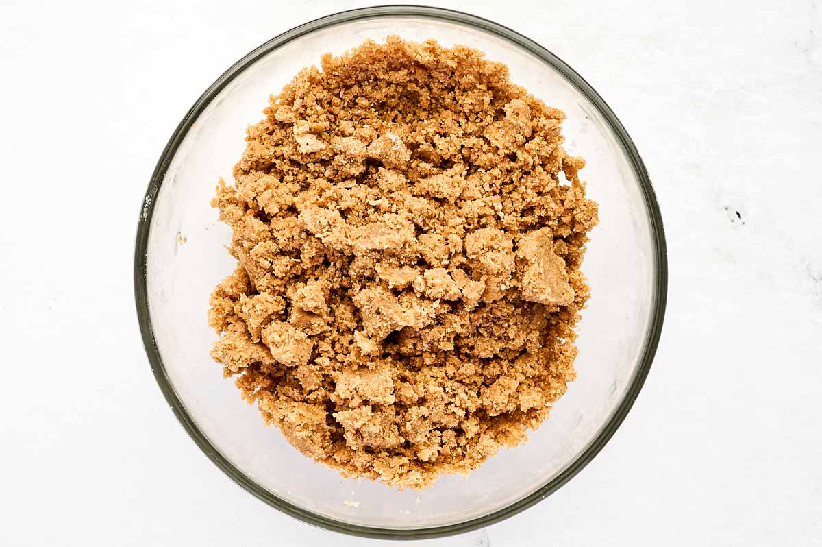 overhead view of streusel in glass bowl