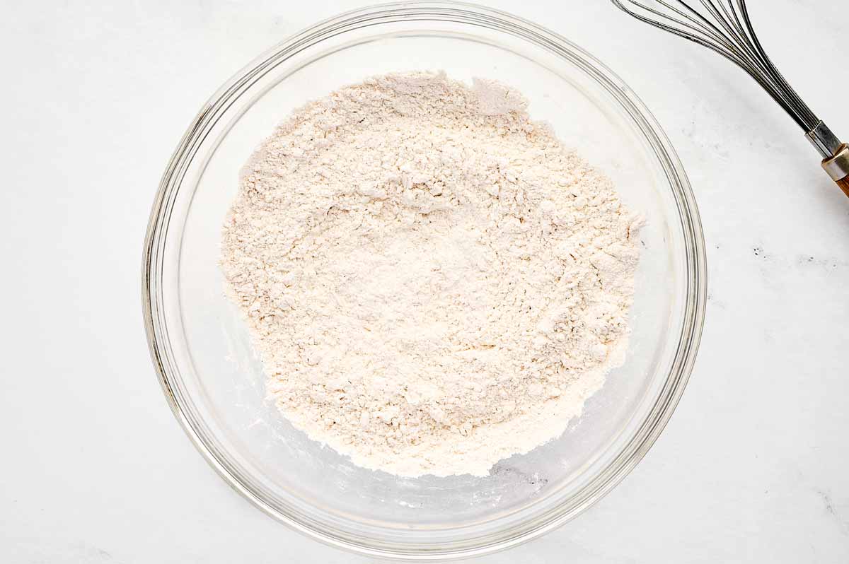 overhead view of flour mix in glass bowl