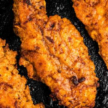 overhead close up view of fried chicken piece