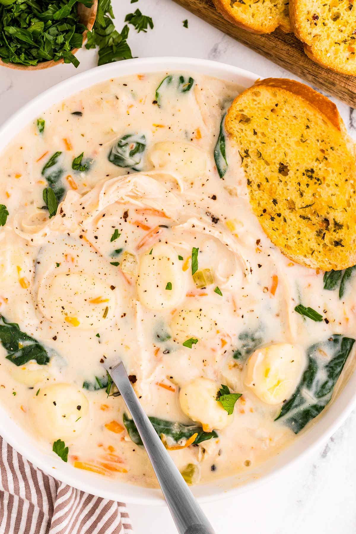 overhead view of chicken gnocchi soup in bowl