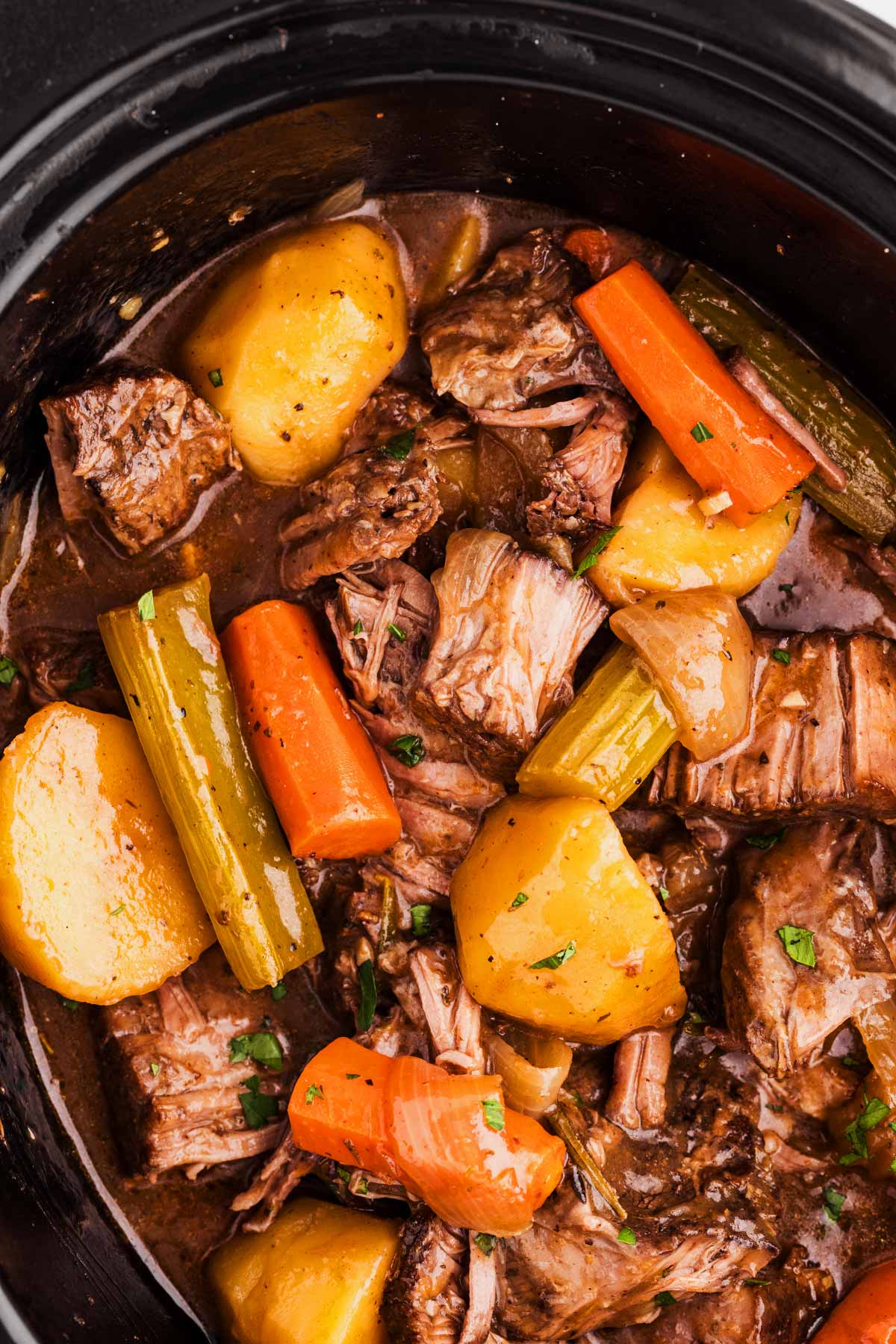 overhead view of pot roast in crockpot