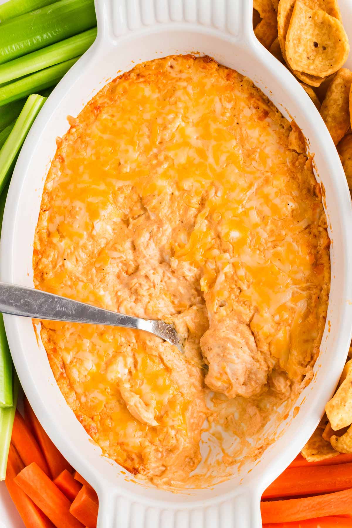 overhead view of buffalo chicken dip with spoon