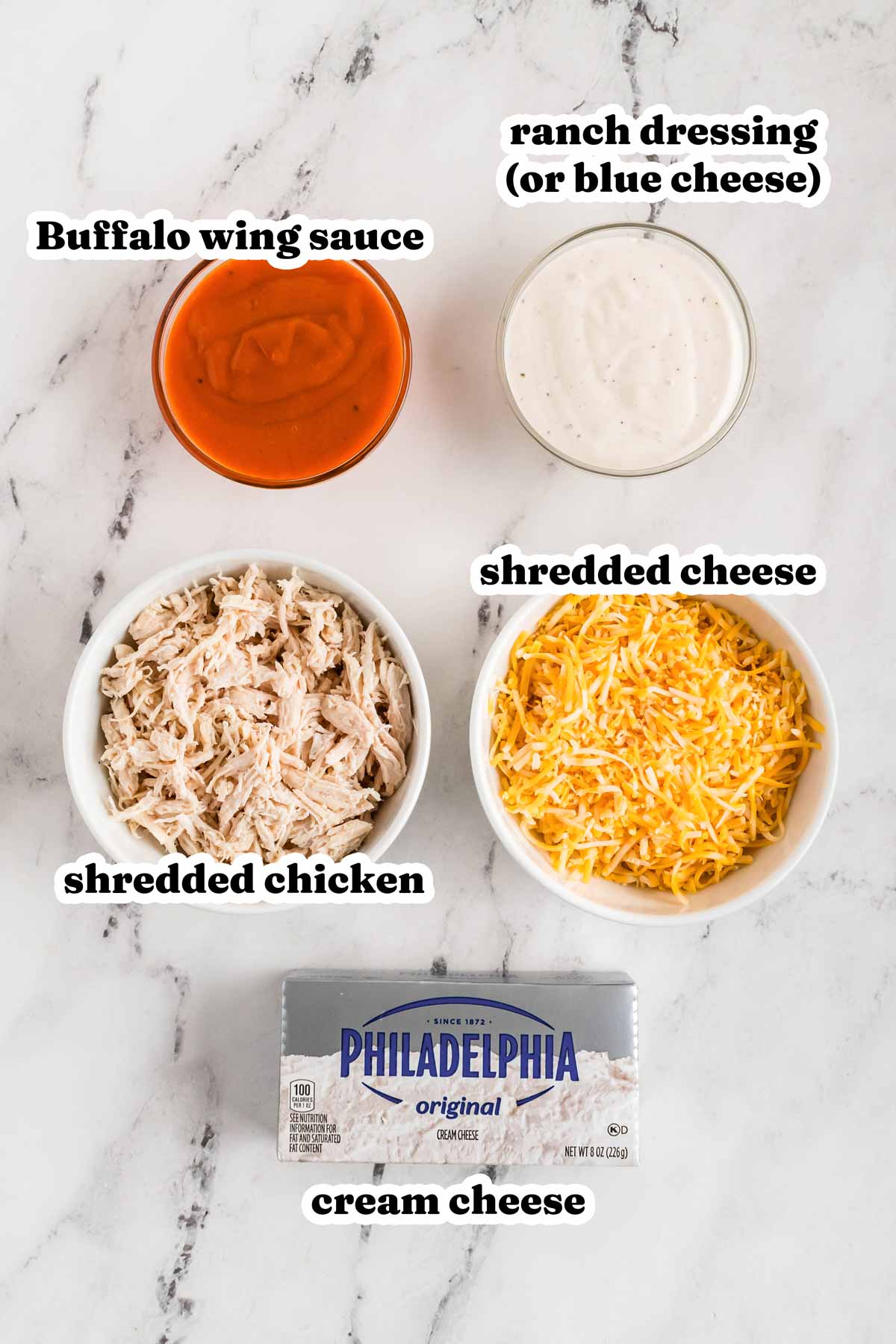 overhead view of ingredients to make buffalo chicken dip