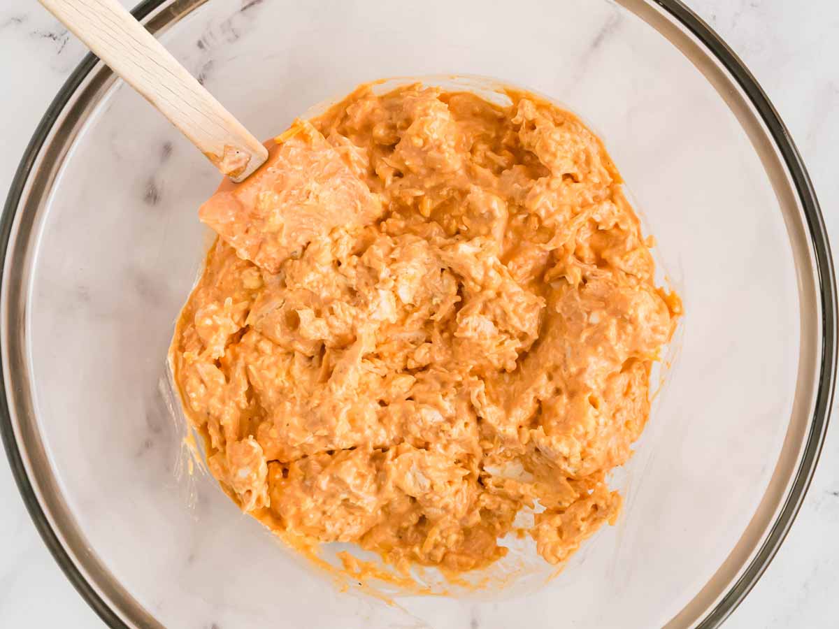 overhead view of buffalo chicken dip mixture in bowl