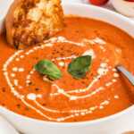 frontal view of tomato soup in bowl