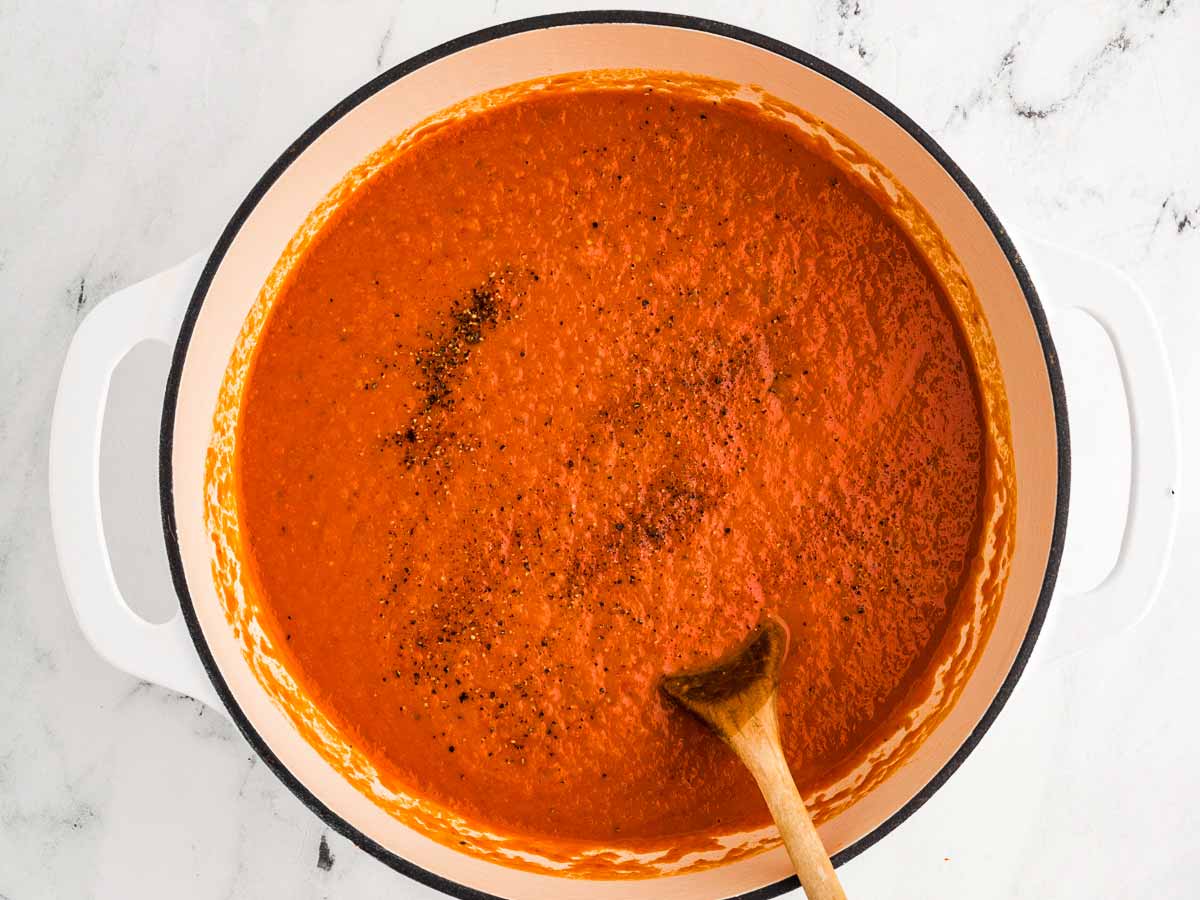 overhead view of blended tomato soup in pot