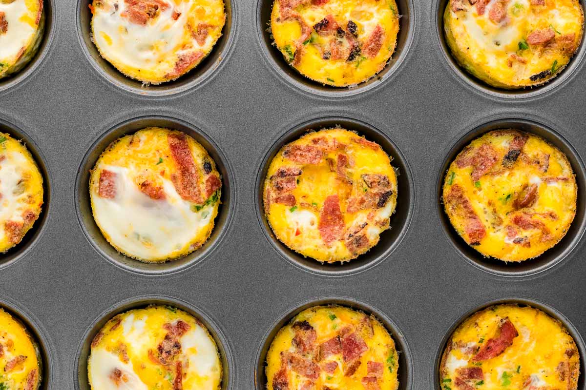 overhead view of baked egg bites in muffin pan