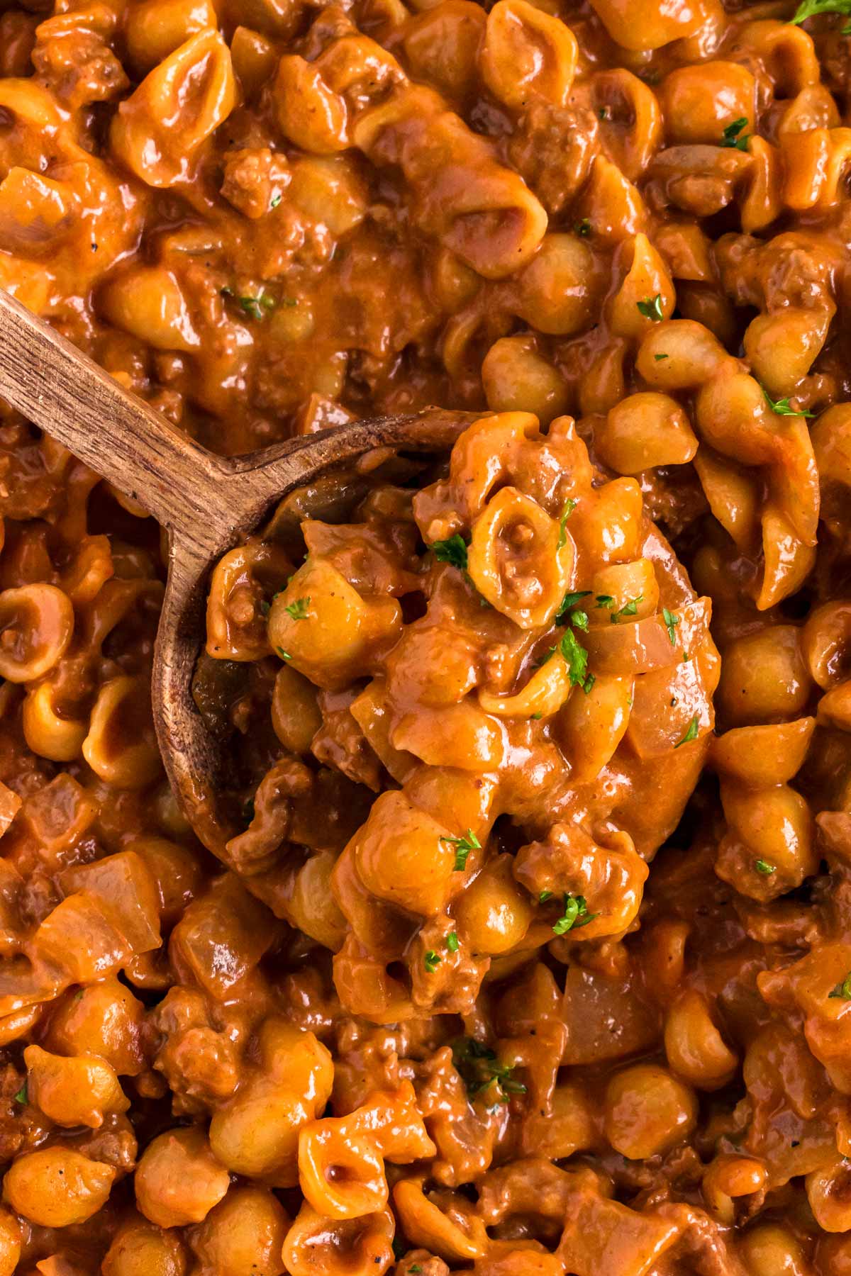 overhead close up view of hamburger helper on wooden spoon