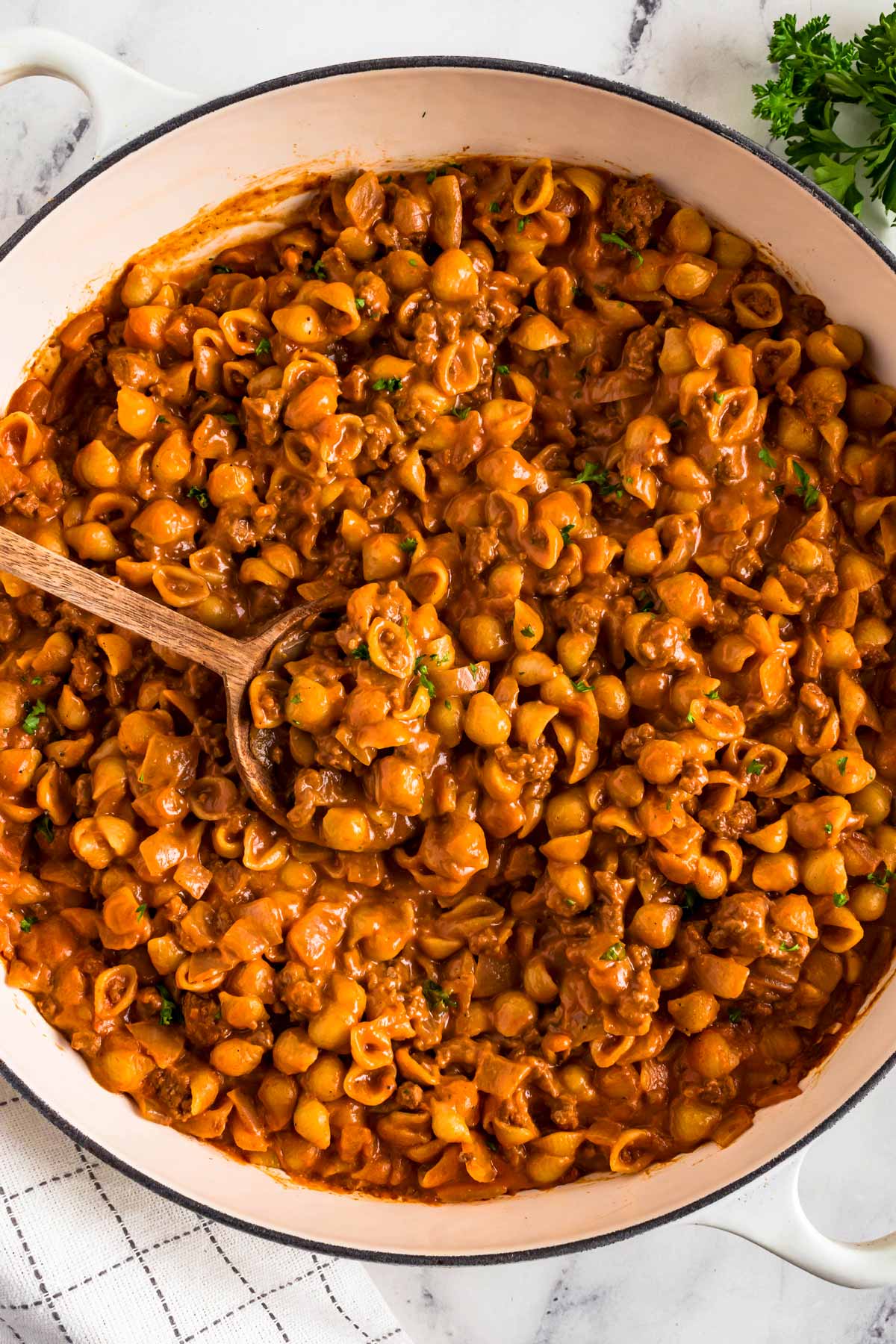 overhead view of hamburger helper in white pot