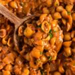 overhead close up view of hamburger helper on wooden spoon