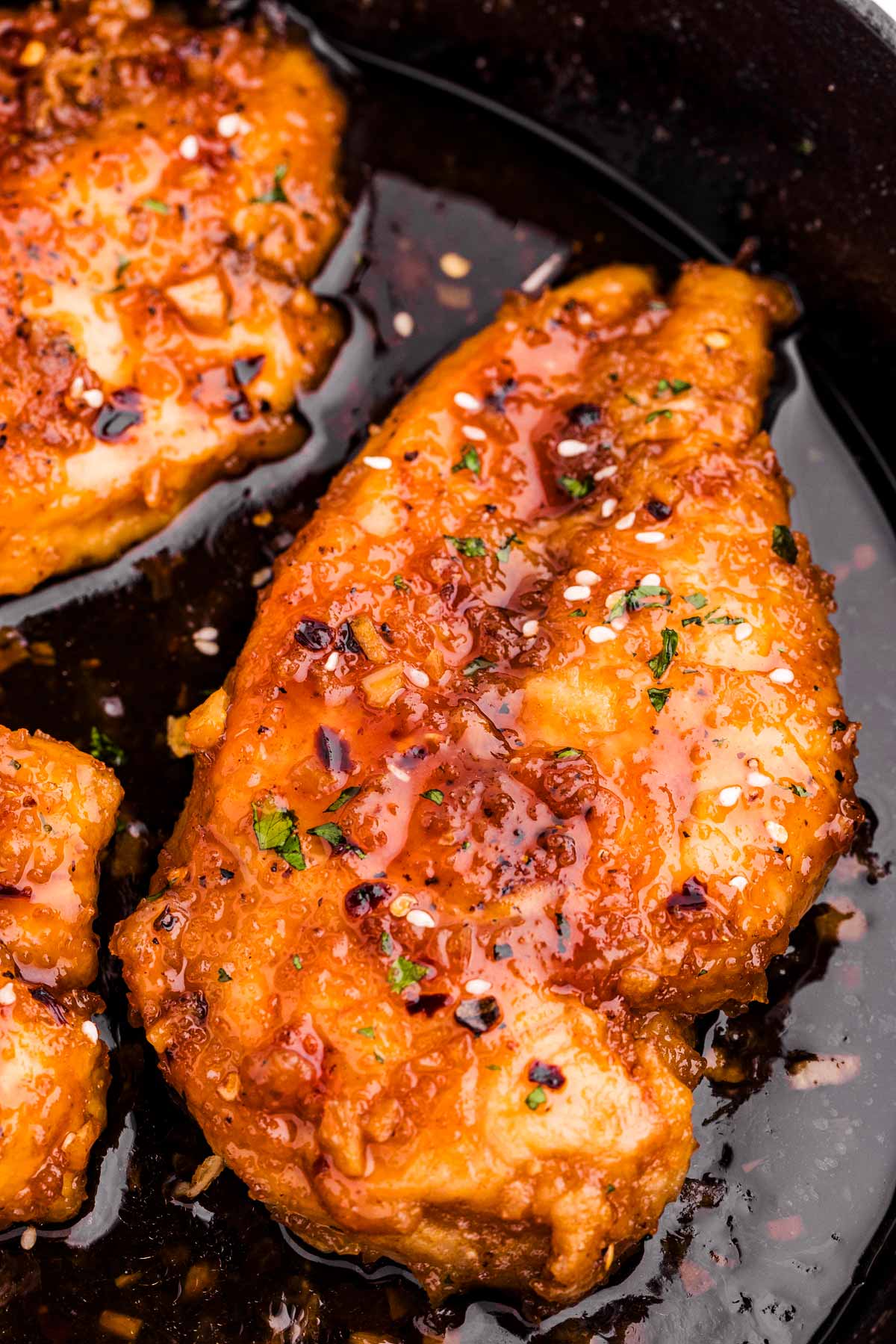 frontal view of honey garlic chicken in skillet