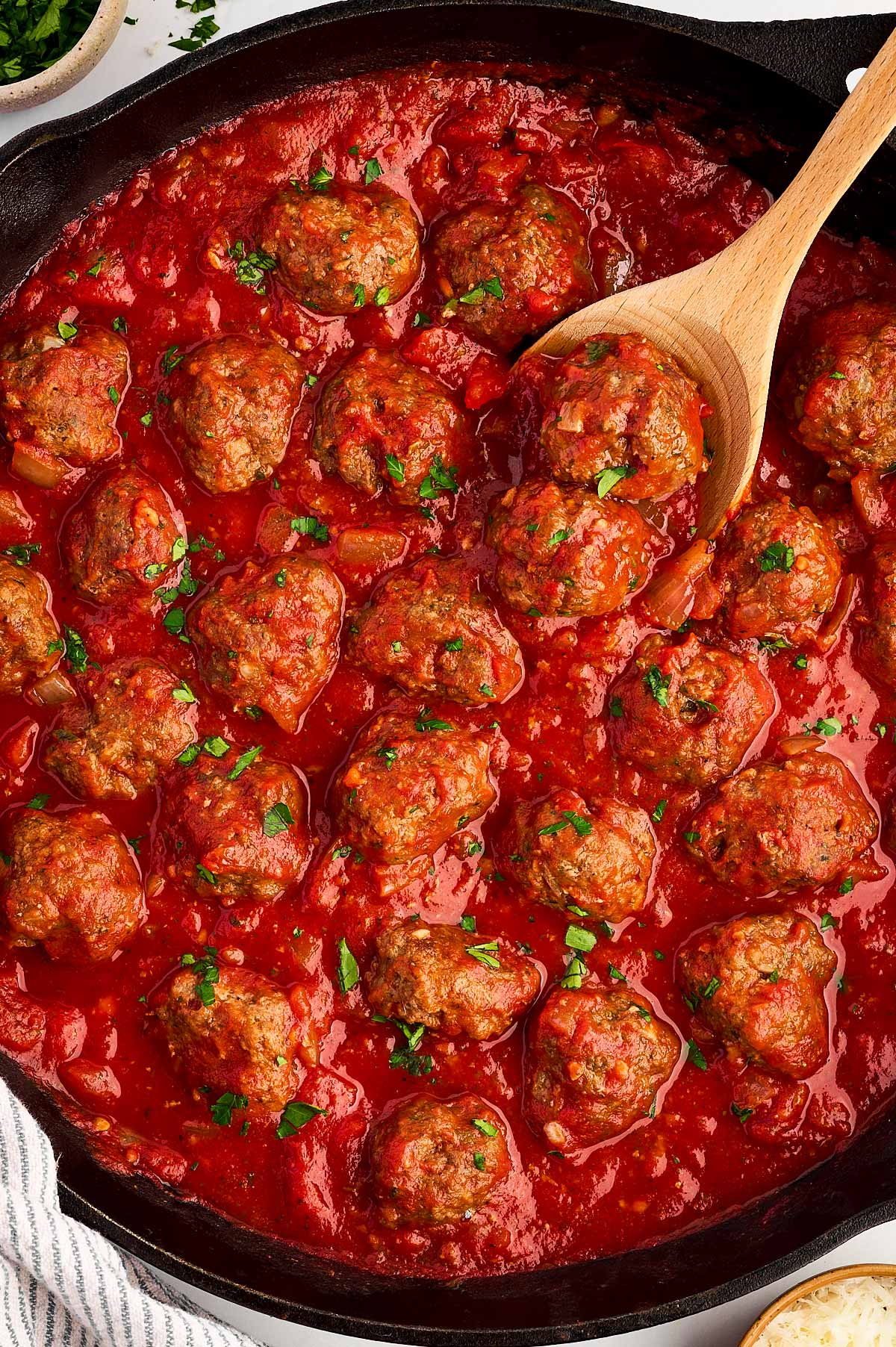 overhead close up view of Italian meatballs in tomato sauce