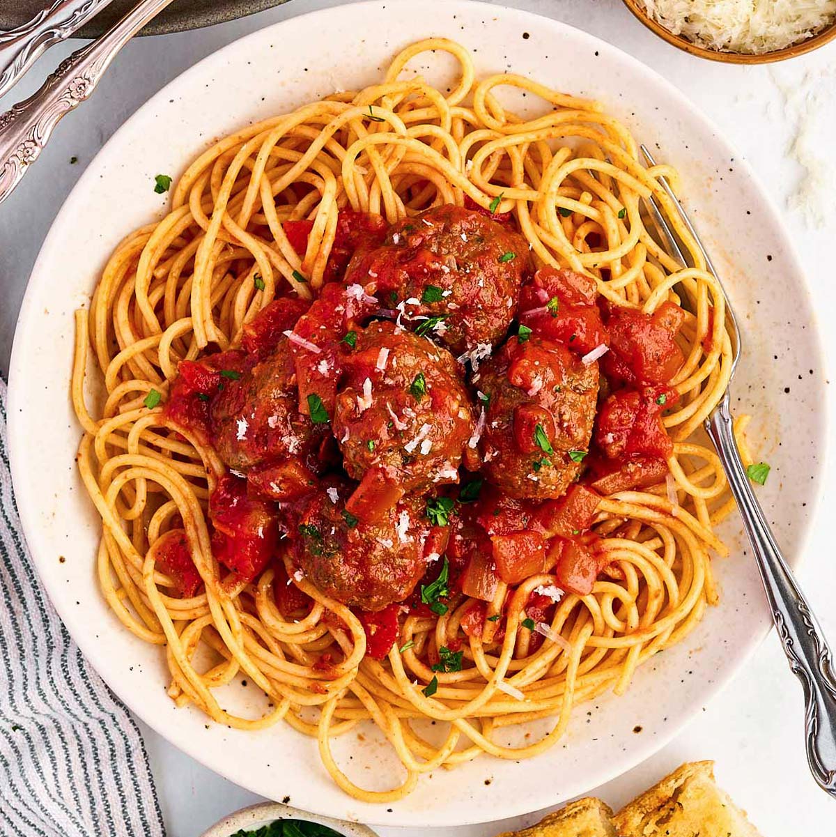 overhead view of Italian meatballs and spaghetti on plate