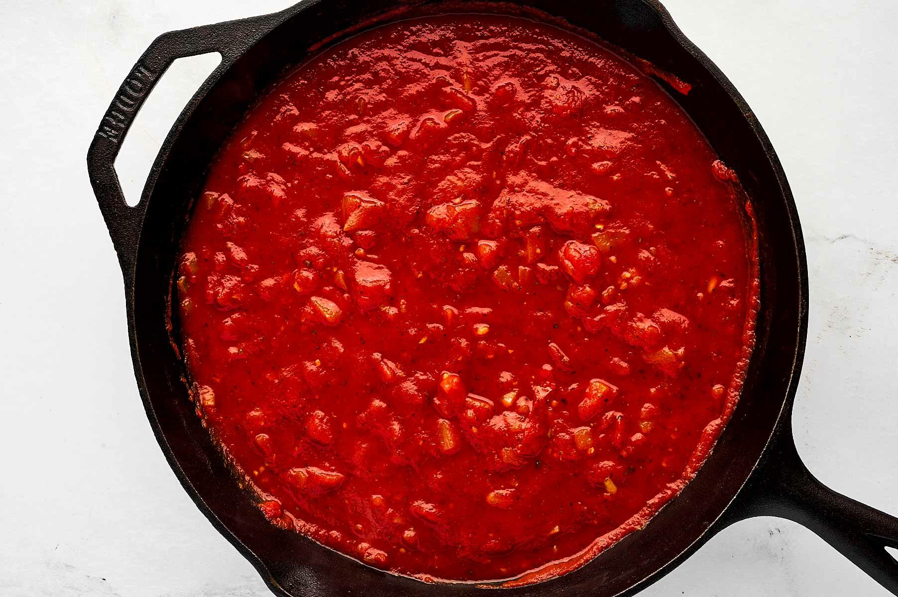 overhead view of tomato sauce in skillet