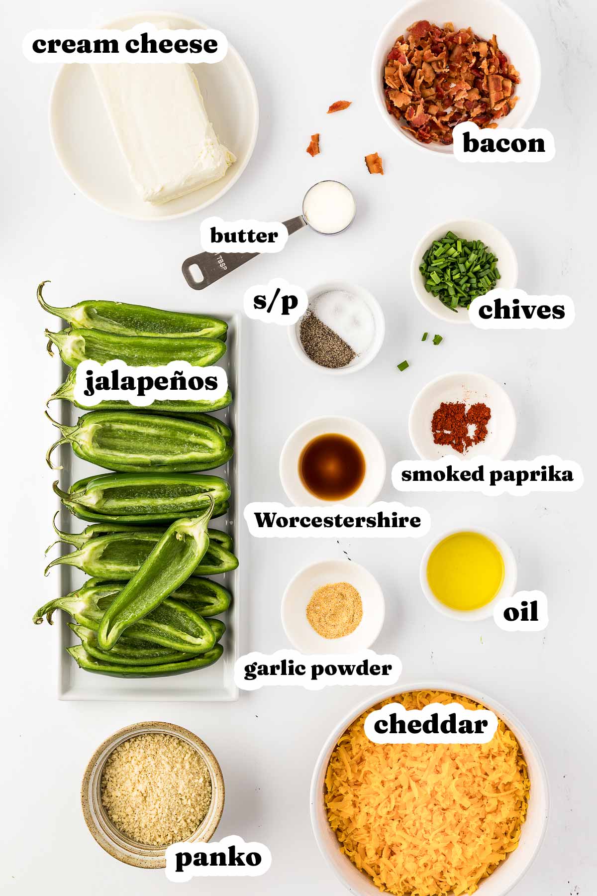 overhead view of ingredients to make jalapeño poppers with text labels