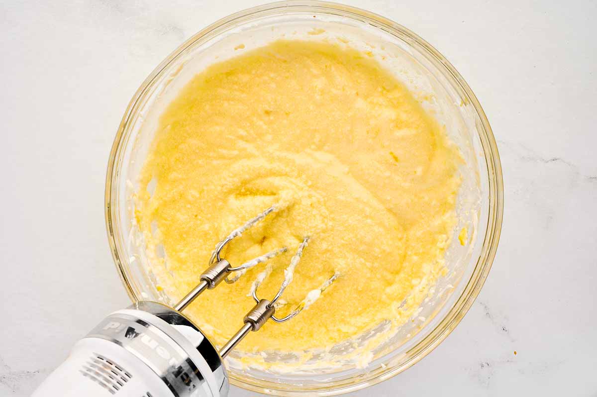 overhead view of creamy butter sugar egg mixture in bowl