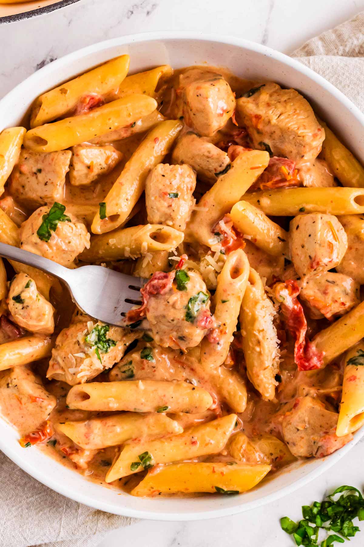 overhead view of marry me chicken pasta in bowl