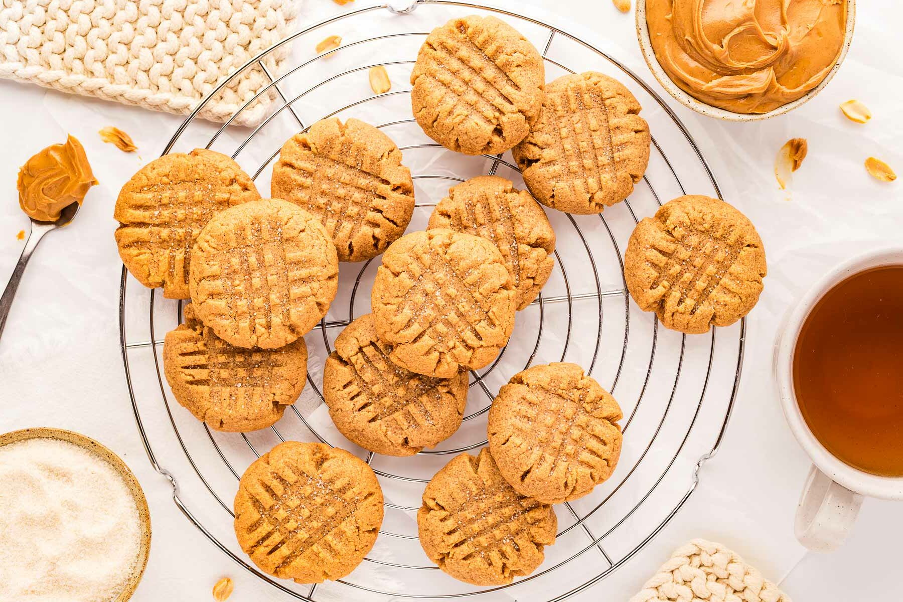 overhead view of peanut butter cookies on wire rack