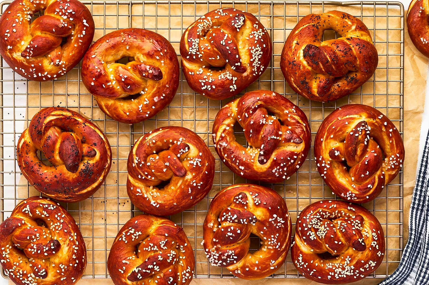 overhead view of soft pretzels on wire rack