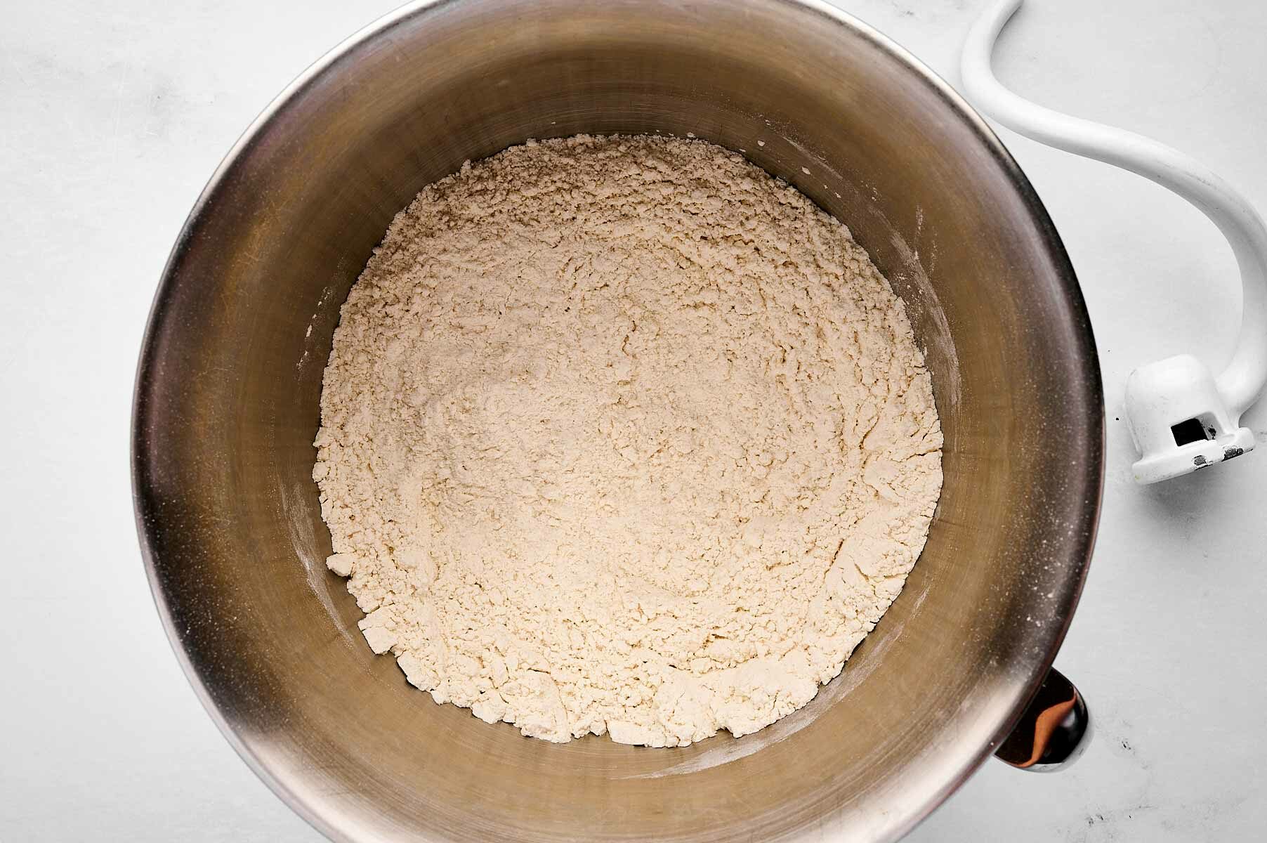 overhead view of dry ingredients in mixer bowl