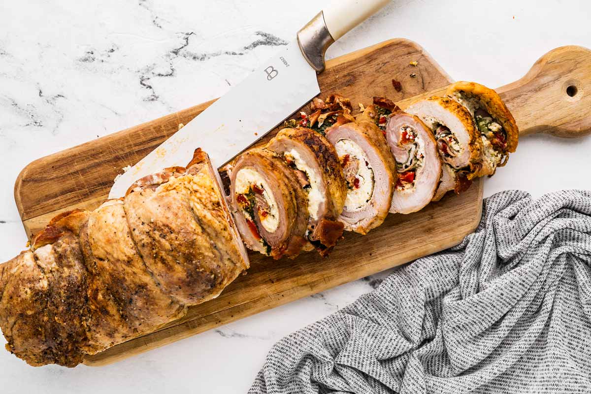 overhead view of sliced stuffed pork loin