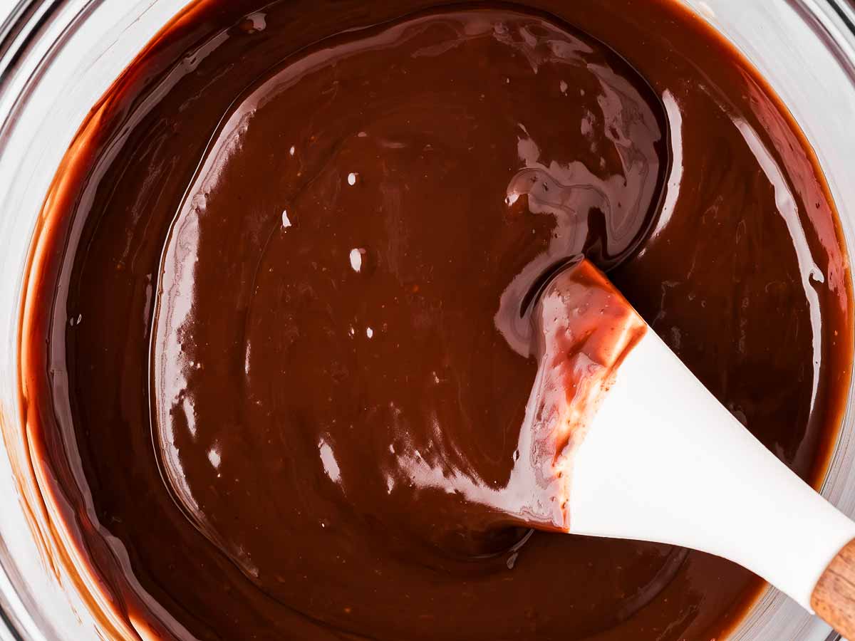 overhead view of chocolate ganache in glass bowl