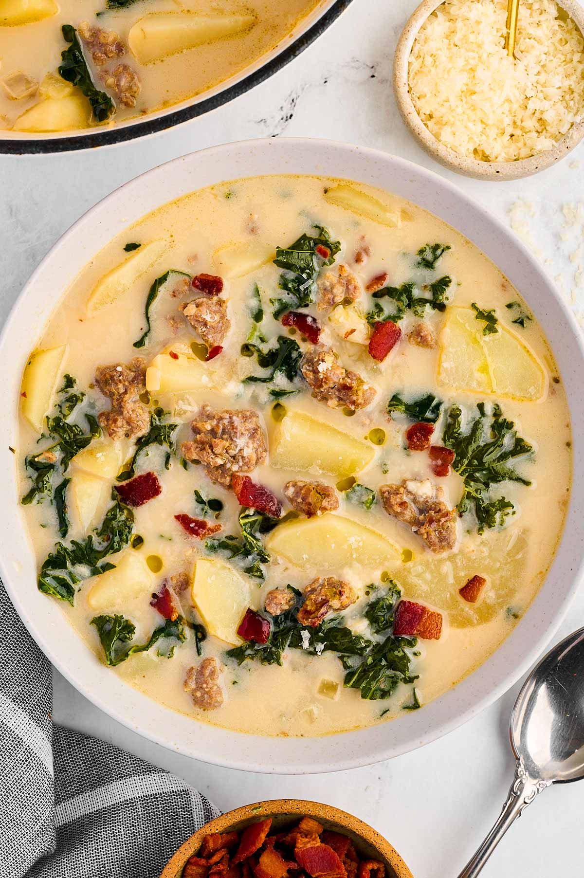 overhead view of Zuppa Toscana in white bowl