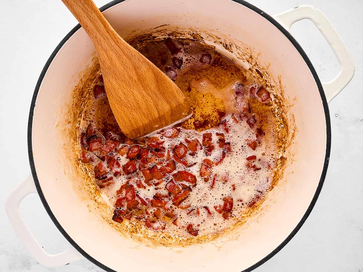 overhead view of cooked bacon in pot