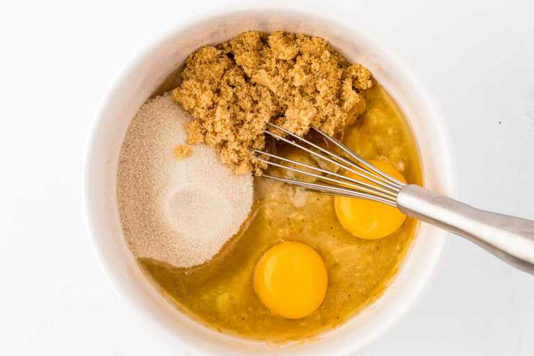 overhead view of wet ingredients for banana bread in bowl