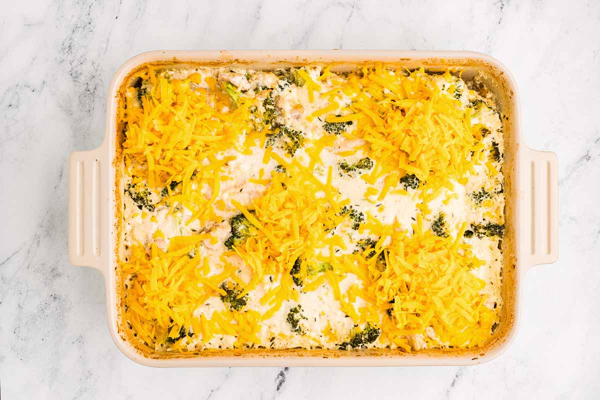 overhead view of almost fully baked broccoli chicken rice casserole with cheese